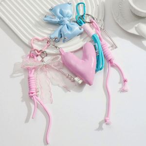 Wholesale Popular Sweet and Fashionable Keyring Pink Series Bow for Love Imitation Pearl DIY Heart Shaped Metal Keychain Pendant - Product Image 1