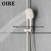 Oire UFO Design White Piano Key 4 Fonctions Ensemble de douche Salle de bain Système de mélangeur de douche à effet pluie chaude et froide de luxe