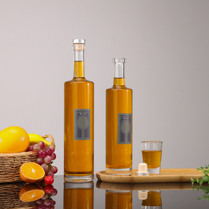 Conteneur de vin de stockage de saké de <span class=keywords><strong>cidre</strong></span> de <span class=keywords><strong>gin</strong></span> clair 500/750ml bouteilles en verre rondes de vodka hydromel de brandy de boisson d'alcool de boisson d'alcool avec couvercle en liège - Product Image 1