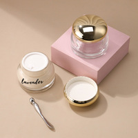Pot en verre unique de 50g de pot de crème de gommage pour le visage couvercle galvanisé doré logo personnalisé pommade remplie de 50ml pots en verre pour le soin de la peau des yeux