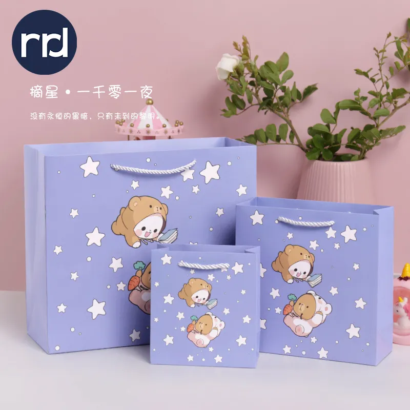 RR Donnelley Wholesale Custom Eco Friendly Cheap Paper Foldable Garment Shopping Candy Gift Bags Baptism Bag with Ribbon Handles