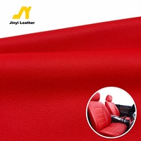Sarung jok mobil kulit PVC timbul 0.85mm Modern kustom tahan air merah kulit sintetis tahan lama untuk penggunaan Sofa