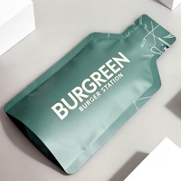 Sachet Mylar thermoscellable imprimé sur mesure en forme de bouteille pour l'emballage de gels énergétiques sportifs avec encoche de déchirement