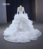 Feishiluo ivoire o-cou robe de bal de mariée moderne luxe perle dentelle robe de mariée avec des fleurs pour les femmes manches longues conception moelleuse