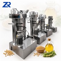 Commerciële semi-automatische hydraulische oliepers voor de verwerking van olijfolie, sojaboon- en plantaardige olie, en voor het persen van sesamolie.