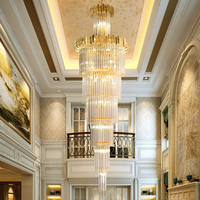 Grand lustre moderne de luxe en spirale dorée K9 Longue lampe Escalier Haut plafond Fournisseur de maison d'hôtel