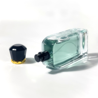 Bouteille en verre de luxe de forme unique de haute qualité 100ml emballage d'huile essentielle de vaporisateur de brouillard vide transparent bouteille de parfum vide
