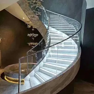 Escadas internas econômicas modernas de aço com escada curvada de vidro