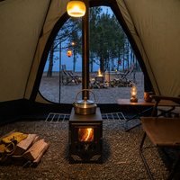 Poêle de camping pliable noir mat à bois, portable, pour cuisson en extérieur avec ouverture supérieure, pieds de support stables et coupe-vent