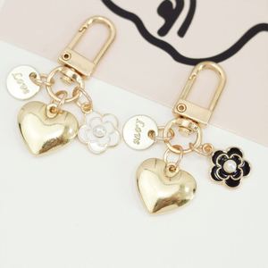 Llaveros Colgantes de Aleación con Forma de Corazón, Bonitos y de Alta Calidad, al por Mayor, con MOQ Bajo, en Stock, para Accesorios de Fundas de Auriculares y Colgantes de Bolsos - Product Image 5