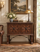 Buffet rustique en bois vieilli avec portes à étoiles sculptées et pieds à griffes pour salon et entrée