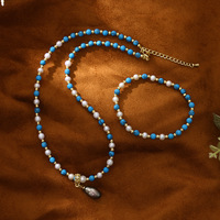 Collier pendentif perle noire, bracelet perle d'eau douce naturelle turquoise, ensemble de bijoux élégant et classique pour femmes, idéal pour les rendez-vous