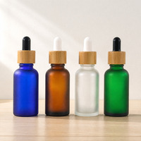 Botol Kaca Kosong Grosir OEM Amber Biru Hijau Leher Sekrup Kapasitas Kustom Botol Kosmetik untuk Pengisian Minyak Esensial