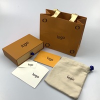Boîtes coulissantes en carton rigide pour colliers avec pochette et brochures, impression gaufrée jetable avec pelliculage mat