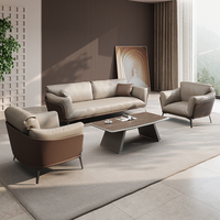Ensemble canapé et table basse de bureau en cuir, design moderne et épuré, produit phare pour la réception et les négociations professionnelles
