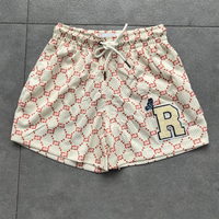 Logo imprimé personnalisé Streetwear Basketball Nylon Polyester Gym Sports Short cargo surdimensionné en maille pour hommes