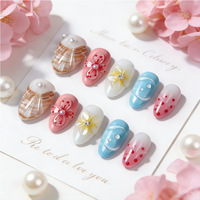 Fournitures pour ongles en gros : Faux ongles à presser en verre rose nude dégradé, avec motifs 3D en relief (coquillage, hibiscus, goutte d'eau) et forme amande