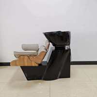 Fauteuil de lavage inclinable de luxe en cuir PU noir avec structure en fibre de verre céramique, design minimaliste moderne pour salon de coiffure professionnel
