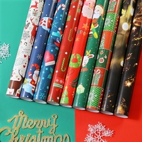 Rouleau de papier cadeau de Noël en papier couché épaissi pour emballage de boîtes cadeaux, vente en gros