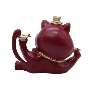 Chat souriant porte-bonheur en résine avec accents dorés, inspiré du charme de la prospérité, parfait pour décorer les maisons modernes, les bureaux et les étagères. - Product Image 2