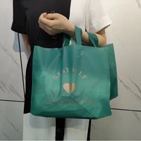 Emballage personnalisé Sac à provisions en plastique sac à provisions en plastique transparent PE personnalisé avec logo pour vêtement