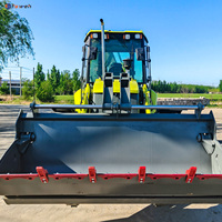 Chargeuse-pelleteuse 4x4 haut de gamme avec bras double enveloppant, caméra de recul et moteur haute puissance