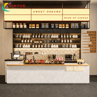 Comptoir de magasin de bubble tea vert menthe avec étagères de présentation en verre, panneaux de menu numériques, solution professionnelle tout-en-un pour la vente au détail