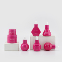 Set Kemasan Perawatan Kulit Profesional 30ml Botol Kaca Pink Bentuk Geometris Unik Wadah Krim Wajah Kosong