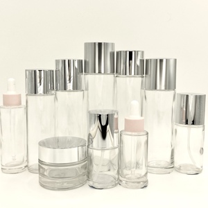 Guangzhou Glass Bottle Manufacturer Wholesale Cosmetic Glass Bottle Set Luxury Custom Glass Bottle