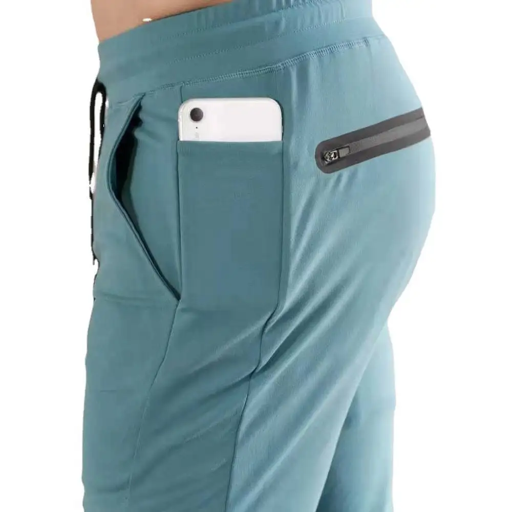 Joggers apilados Pantalones de gimnasio para hombre con bolsillos para teléfono Correr Deportes Jogging Pantalones de gimnasio Pantalones de entrenamiento Pantalones de chándal