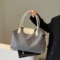 Sac fourre-tout élégant en tissu Oxford de grande capacité (20-35L) de couleur unie, léger, idéal pour les voyages d'affaires, les vols en cabine et les déplacements.