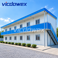 VICDOWEX Maison préfabriquée de luxe en forme de T personnalisée avec panneaux en acier et sandwich pour bureau de chantier et logement à long terme