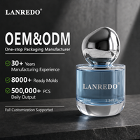 Bouteille de parfum en verre lestée personnalisée en gros, 50 ml, 100 ml, cylindrique, vide, avec bouchon en forme de galet argenté
