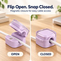 Clips magnétiques pour câbles avec couvercles rabattables et bases adhésives pour l'organisation des cordons de charge sur les bureaux et les tables de chevet