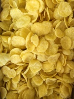 Ligne de production entièrement automatique de céréales pour le petit-déjeuner, extrudeuse alimentaire à double vis, machine industrielle de fabrication de céréales pour usine de snacks