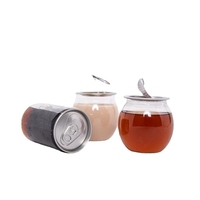 Vente en gros de canettes transparentes en forme de boule boîtes de conserve de qualité alimentaire en plastique PET de haute qualité pot de jus bouteilles de café soda boisson