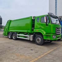 Camion Compacteur de Déchets Électrique d'Occasion Howo 6x4 de Bonne Qualité avec Système Hydraulique 20cbm 21cbm 22cbm Prix