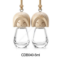 Vente en gros de diffuseurs de parfum pour voiture en verre transparent personnalisés de 8 ml, mini flacons suspendus pour aromathérapie avec emballage, thème Noël