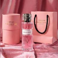 Vente en gros d'usine, flacon de parfum en verre transparent avec étiquette personnalisée, 100 ml, 50 ml, flacon en verre vide avec boîte en tube de papier et sac pour femmes