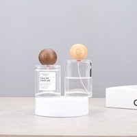 Bouteilles en verre transparentes de 30 ml et 50 ml, forme sphérique plate, avec buse en aluminium portable et bouchon à vis, design de pulvérisation sous pression rechargeable