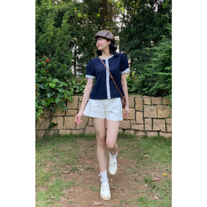 เสื้อยืดผู้หญิงราคาดีที่สุด หลายสี สไตล์เกาหลี ทรงเข้ารูป ผ้าฝ้าย 65% คุณภาพพรีเมียม บรรจุภัณฑ์กะทัดรัด ผลิตในเวียดนาม ติดกระดุม - Product Image 3