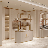 Kiosque de présentation de parfums modulaire personnalisé, bar à parfums mobile avec vitrine en verre éclairée par LED pour les magasins de vente de parfums