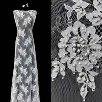 Dentelle de tulle perlée à motif floral dispersé, avec feuilles et cils, en tube de perles, matériau de qualité supérieure pour robe de mariée ou de soirée formelle