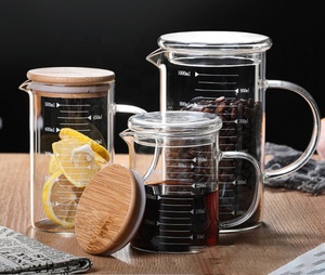 Tasses à mesurer <span class=keywords><strong>en</strong></span> <span class=keywords><strong>verre</strong></span> borosilicate transparent, écologiques, personnalisables <span class=keywords><strong>en</strong></span> gros, avec poignée isolante, faites à la main et soufflées à la bouche - Product Image 6
