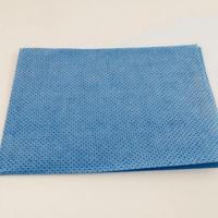 Paños de tela no tejida Spunlace de 10 mallas con orificios redondos, teñidos por completo, con código de color
