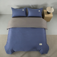 Parure de lit 100 % coton 4 pièces, housse de couette réversible à blocs de couleur, design à bordure large, linge de lit moderne et minimaliste pour la maison