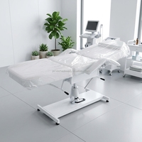 Table de massage hydraulique professionnelle réglable avec base robuste, idéale pour les cliniques de médecine esthétique et les salons de beauté