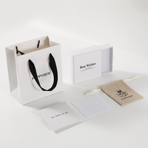 PUPPYSEW Sac en papier blanc personnalisé avec votre logo, sac à main en gros, sac de shopping blanc - Product Image 1