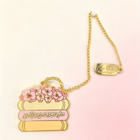 Marque-page en métal personnalisé en forme de livre Sakura, émail doré, texte arabe gravé, avec chaîne de perles et pompon, cadeau pour les amateurs de livres