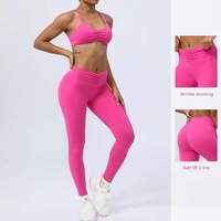 Ensemble de sport deux pièces pour femme, style international, avec dos élégant, comprenant un haut court uni avec coussinets de poitrine et un pantalon de yoga, idéal pour l'été
